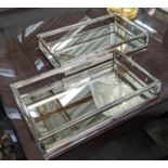 COCKTAIL TRAYS, a pair, mirrored with polished metal detail, 39.5cm x 24.5cm x 7cm. (2)