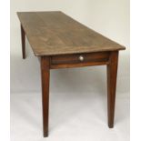 FARMHOUSE TABLE, 19th century French oak with planked and cleated top above an end drawer and square