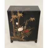 CHINESE SIDE CABINET, black lacquered and gilt Chinoiserie and bamboo palm decorated with two doors,