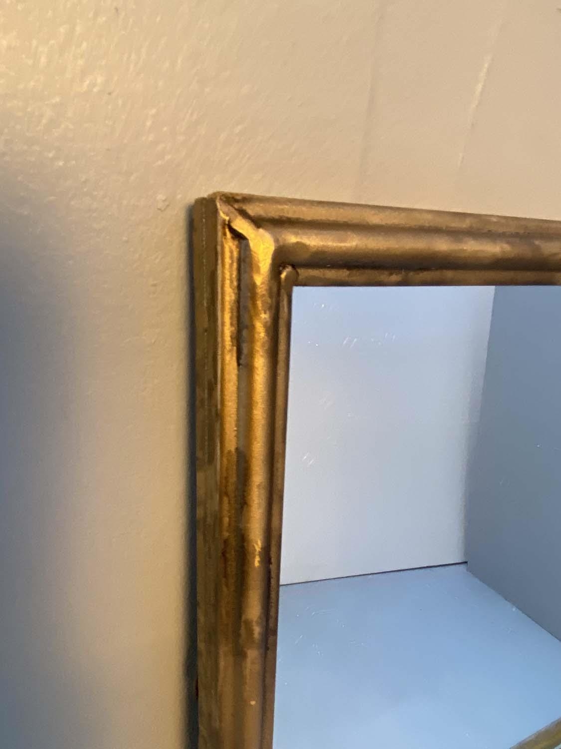 ARCHITECTURAL WALL MIRROR, 110cm high, 110cm wide, segmented overlaid gilt metal frame. - Image 2 of 3