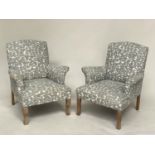 ARMCHAIRS, a pair, arched with button back and scroll arm printed grey upholstery, 70cm W. (2)