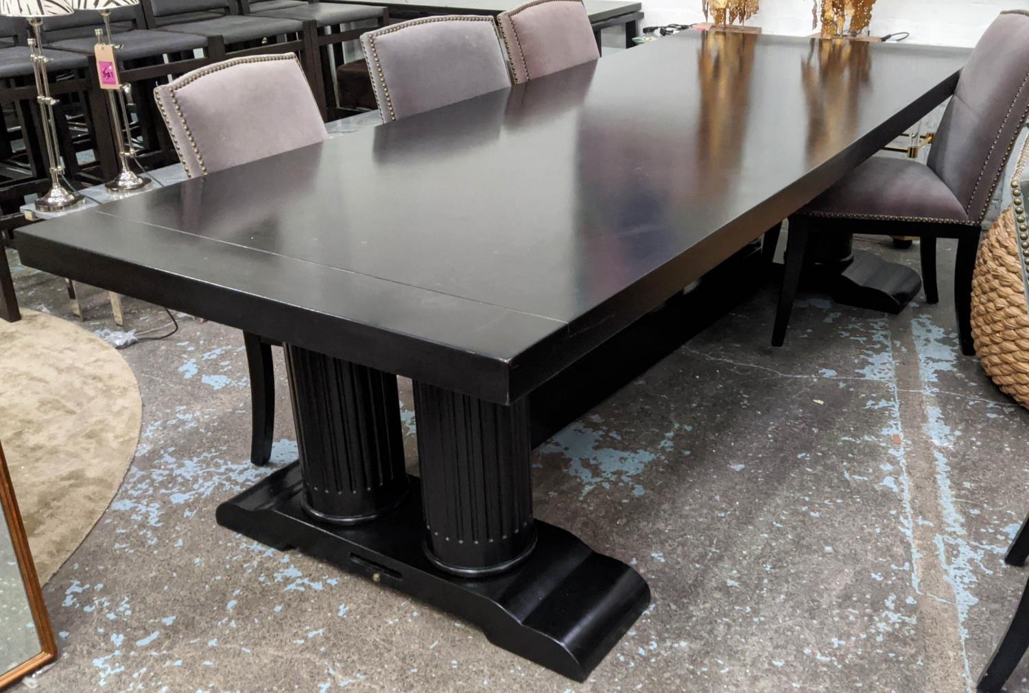 DINING TABLE, ebonised finish, double pedestal base with twin column detail, 270cm x 110cm x 77cm.