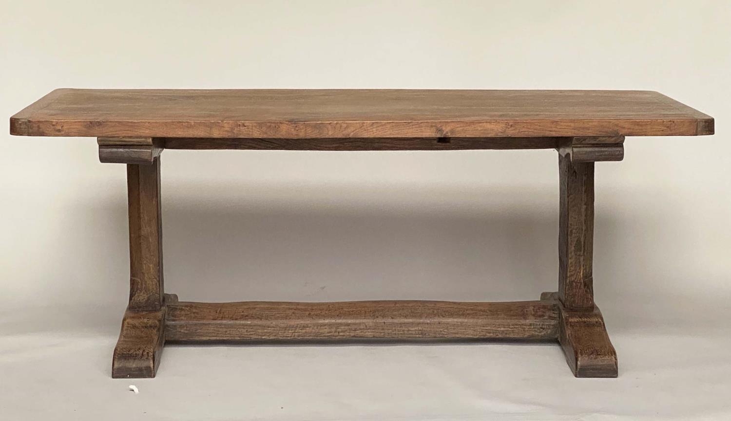 REFECTORY TABLE, antique English oak rectangular cleated on substantial carved trestle and stretcher