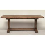 REFECTORY TABLE, antique English oak rectangular cleated on substantial carved trestle and stretcher