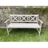 GARDEN BENCH, weathered teak with lattice back and slatted seat, stamped 'Bentley', 146cm W.