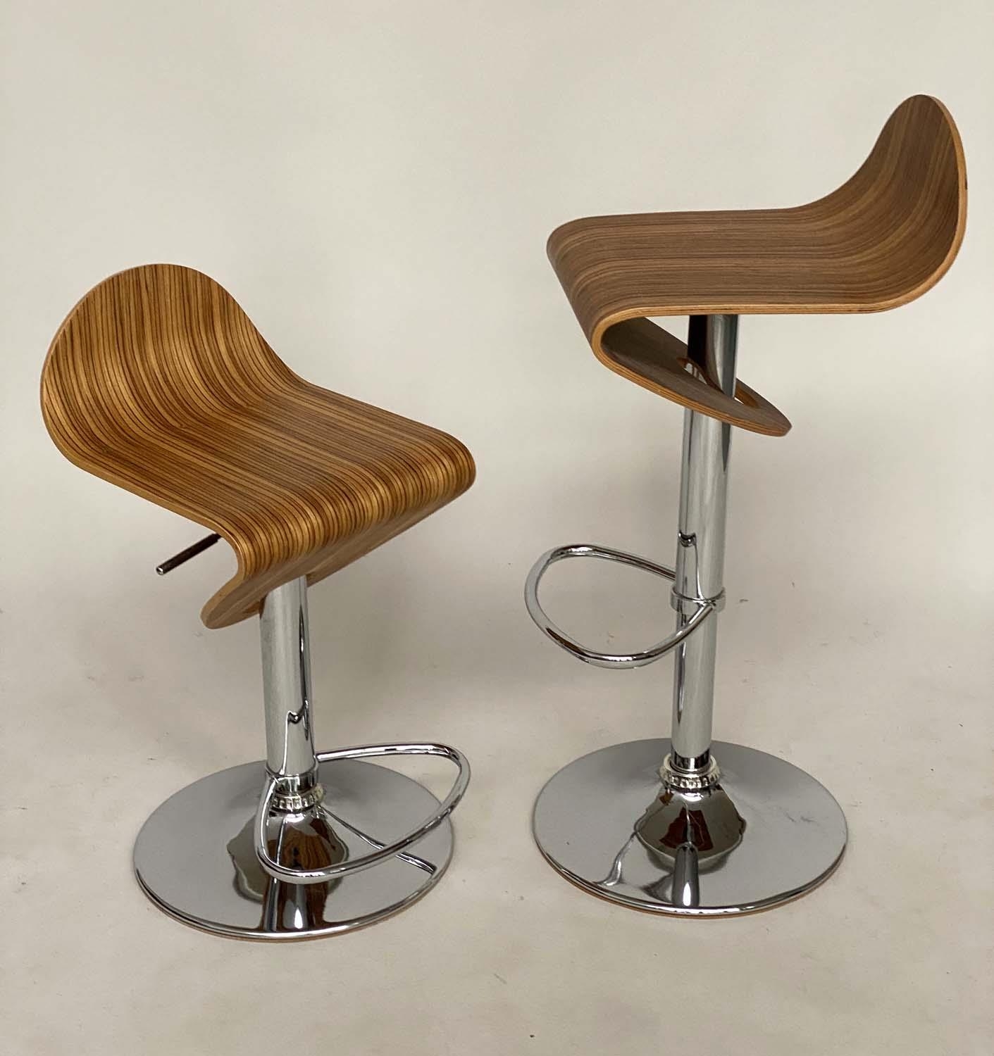 BARSTOOLS, a pair, 1970s style veneered bentwood revolving on height adjustable chrome base with