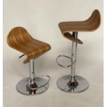 BARSTOOLS, a pair, 1970s style veneered bentwood revolving on height adjustable chrome base with
