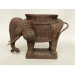 ELEPHANT LAMP TABLE, mid 20th century cane woven with seat table top and plinth, 58cm H x 77cm x