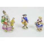 CHELSEA PORCELAIN BAGPIPE BOY AND GIRL WITH LAMB, late 18th century gold ancor period, along with