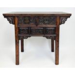 ALTAR TABLE, 19th century Chinese elm, profusely carved front with two frieze drawers, 88cm H x