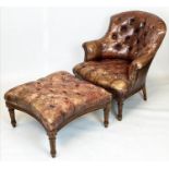 LIBRARY ARMCHAIR AND STOOL, late 19th/early 20th century, buttoned and studded brown leather,