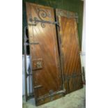 DOORS, each 231cm H x 75cm excluding hinges, a pair, early 20th century stained pine and iron