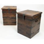 MERCHANT CHESTS, a pair, hardwood and iron bound with rising tops, 57cm H x 46cm x 46cm. (2)