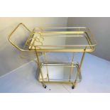 COCKTAIL TROLLEY, 90cm high, 81cm wide, 39cm deep, two-tier form, 1960s French style, mirrored glass