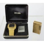 IMADO WATCH, in box and a 1970's gold plated ST Dupont lighter. (2)