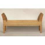 WINDOW SEAT, rectangular cane woven with outswept arms and tapering square section supports, 148cm W
