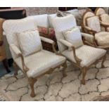 OPEN ARMCHAIRS, a pair, 72cm W x 97cm H each with floral patterned upholstery and a loose scatter