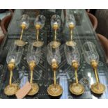 VAUGHAN WALL LIGHTS, a set of nine, gilt metal with glass shades, 18cm x 10cm x 43cm each. (9)