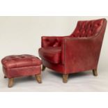 ARMCHAIR AND STOOL, club style antique aged and brass studded scarlet leather upholstered with