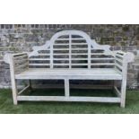 LUTYENS STYLE GARDEN BENCH, weathered teak of slatted constructions after a design by Sir Edwin