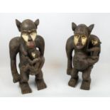 MONKEY STATUES, a pair, Cameroon, 60cm H. (2)