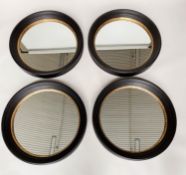 WALL MIRRORS, a set of four, Regency style circular ebonised and gilt each 95cm W. (4)