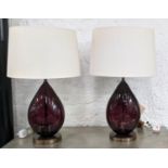 TABLE LAMPS, a pair, indigo glass and gilt metal, with shades, 64cm H. (2)