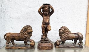 PUTTI CANDLESTICK AND A PAIR OF LIONS. (3)