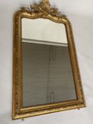OVERMANTEL MIRROR, 19th century French giltwood and gesso moulded with foliate arched and C scroll