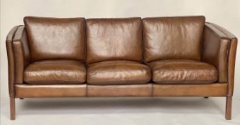 STOUBY DANISH SOFA, 1970s mid brown grained tan leather, three seater with teak supports, 200cm W.
