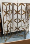 SCREEN, three fold gilt metal with foliate detail, each panel 150cm H x 41cm.