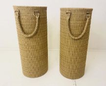 UMBRELLA STANDS, pair, of thick woven fabric upholstered finish, 125cm high, 51cm diameter. (2)
