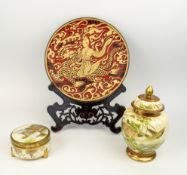 JAPANESE SATSUMA LIDDED VASE AND A LIDDED BOX and a metal and resin plate, plate 25cm diam, box 10cm