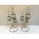 FLOOR STANDING CANDLE LANTERNS, a pair, 75cm high, 34cm wide, 30cm deep, each detachable lantern