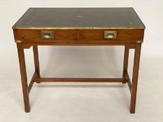 WRITING TABLE, 1970's Campaign style yewwood and brass bound with gilt tooled green leather and