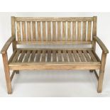 GARDEN BENCH, weathered teak, of slatted construction (matching previous lot), 124cm W.