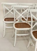 DINING CHAIRS, a set of six, white bentwood and caned seats with 'X' backs. (6)