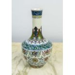 A CHINESE FAMILLE VERTE BOTTLE VASE, Qianlong style, with foliate decoration, 26cm H.