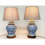 TABLE LAMPS, a pair, blue and white Chinese ceramic of lidded ginger jar form with shades, 65cm