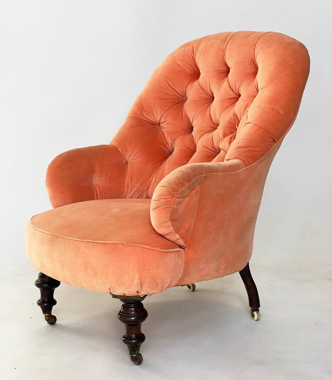 ARMCHAIR, Victorian walnut with 'plush' velvet upholstery, deep buttoned back and turned supports,