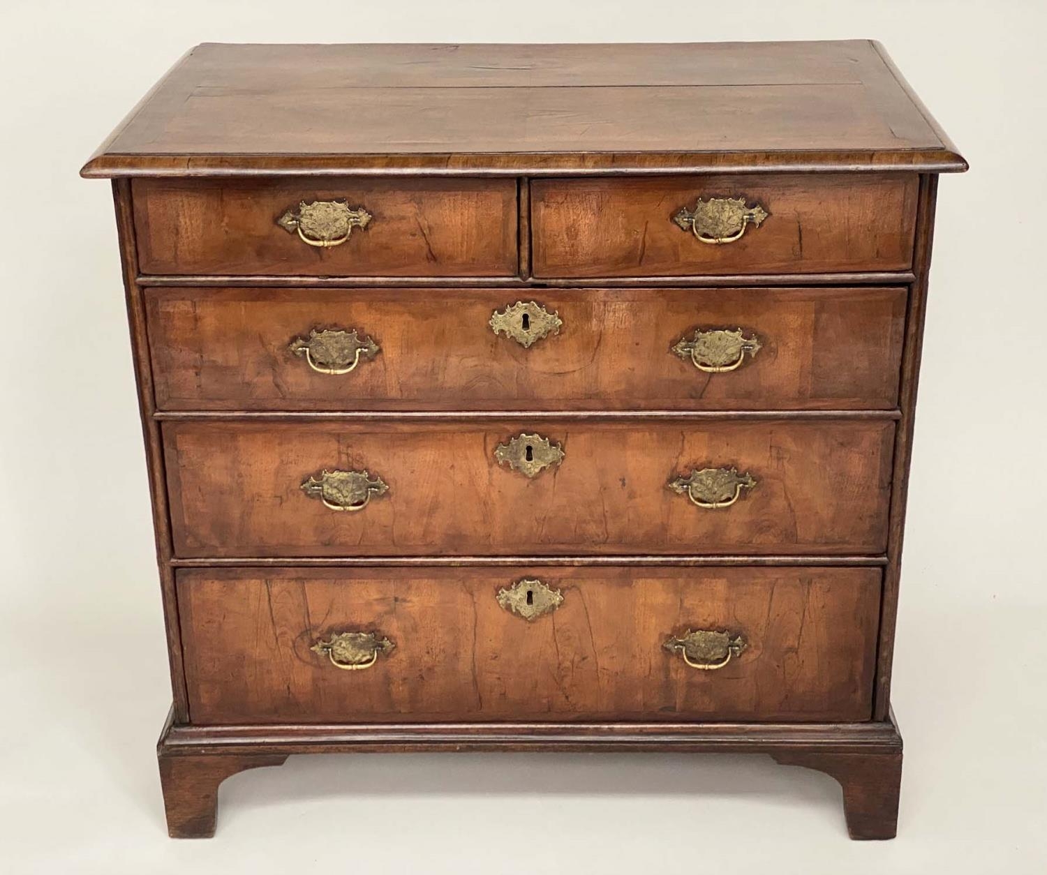 CHEST, early 18th century English Queen Anne figured walnut and crossbanded with two short above