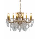 CHANDELIER, 48cm high, 64cm diameter, eight branch form, gilt metal, with lead crystal droplets.