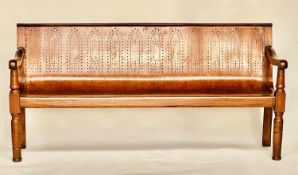 WAITING ROOM BENCH, 19th century mahogany framed with fruitwood and plywood pierced seat, 194cm W.