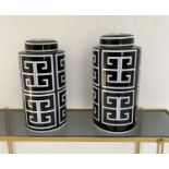 GINGER JARS, a pair, 40cm high, 20cm diameter, glazed ceramic, art deco style design print. (2)