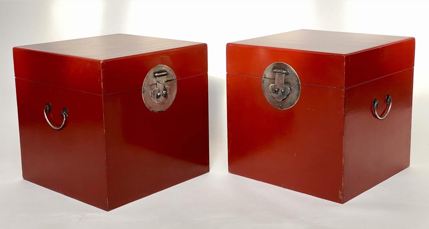 TRUNK SIDE TABLES, a pair, Chinese scarlet lacquered and silvered metal mounted with rising lid,