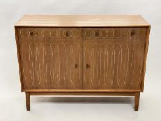 GORDON RUSSELL SIDEBOARD, 1950s walnut with two incised doors, stamped verso 'Gordon Russell,