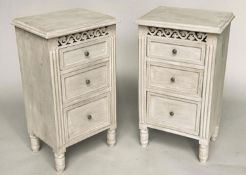 BEDSIDE CHESTS, a pair, French style traditionally grey painted each with three drawers and
