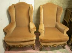 WING ARMCHAIRS, 117cm H x 86cm, a pair, Georgian style carved and gilt heightened in brown