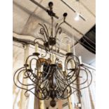 TWELVE BRANCH CHANDELIER, bronzed finish, scrolled branches baluster column to centre, decorative