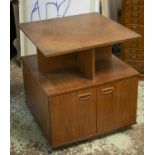 BOOK/COCKTAIL TABLE, 66cm H x 59cm x 59cm, circa 1960 teak with two doors and fall front door on